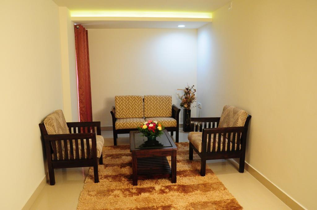 Hotel South Regency, Ernakulam Kochi Szoba fotó